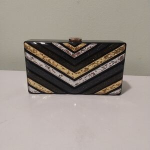 Chic Black, Gold, and Silver Chevron Clutch